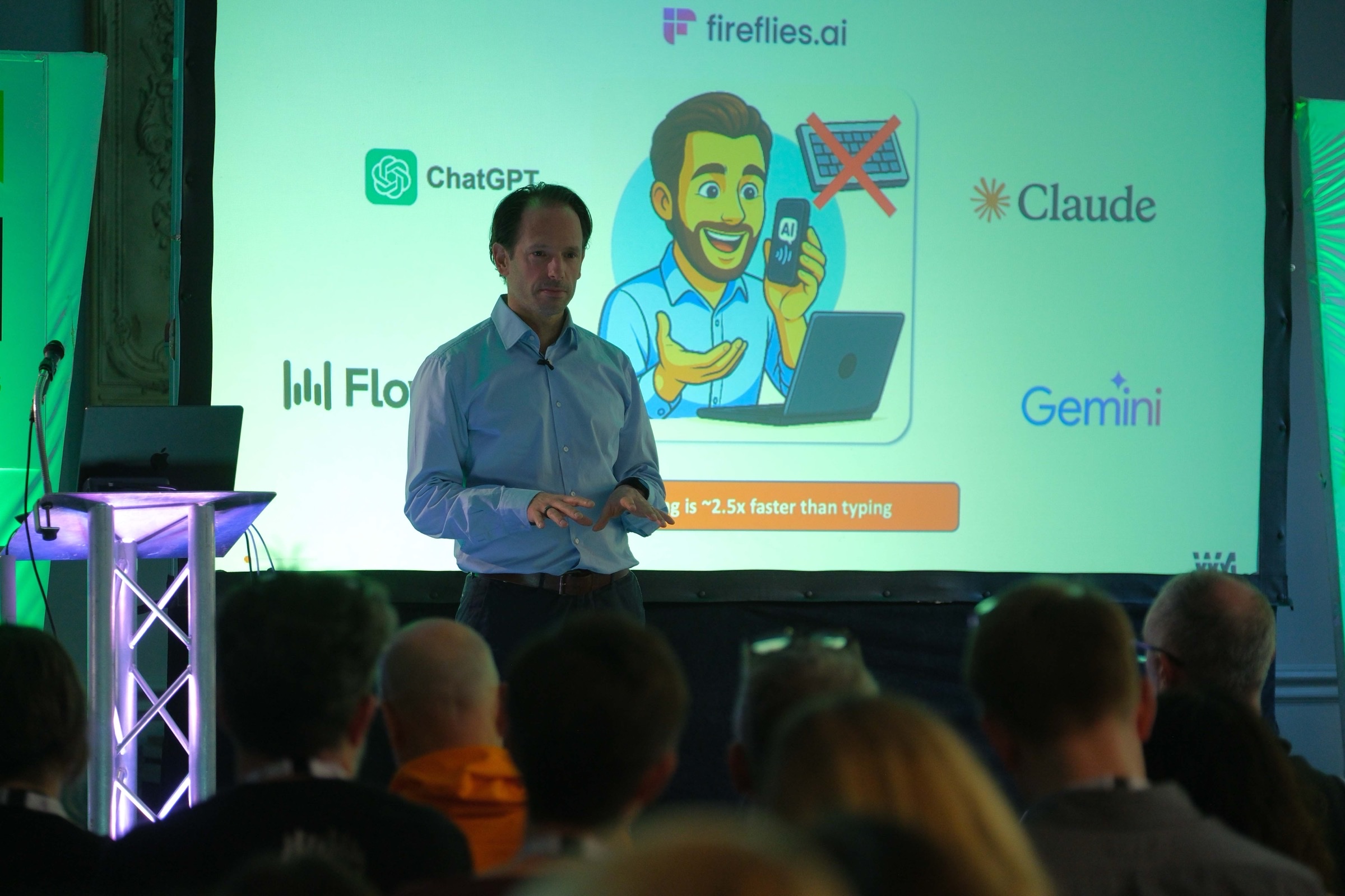 Greg Nieuwenhuys presenting his AI tools on stage